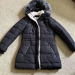 Very warm winter coat with faux fur hood.  Tag says large but fits like medium:)
